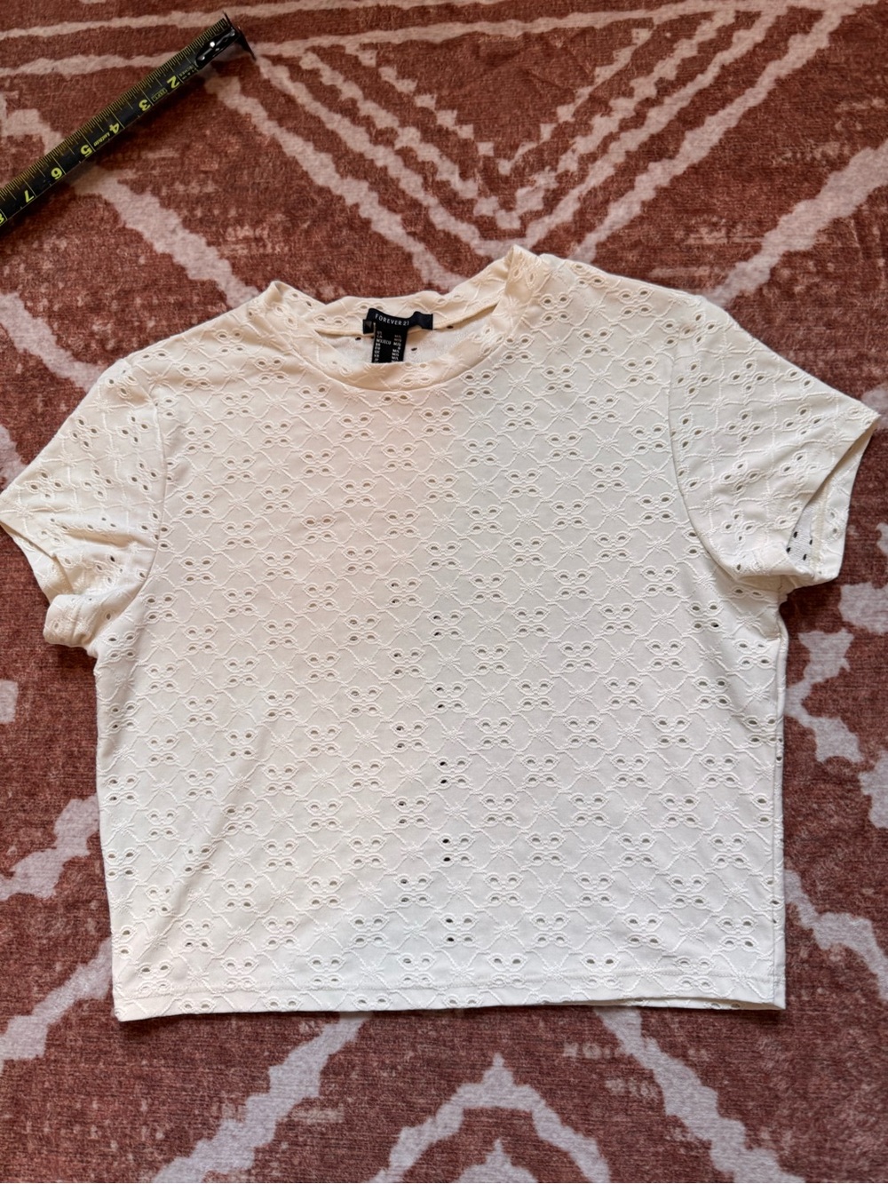 Forever 21 stretch crèam eyelet cropped baby tee size m/l